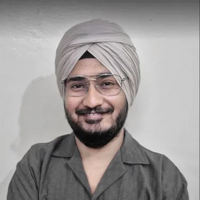 Ranjeet Singh | Experienced Data Specialist Ranjeet Singh – Data Specialist wearing turban and glasses smiling