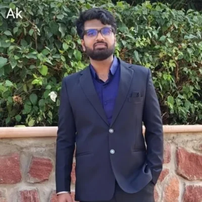 Aditya Kasana | Creative Web Designer Aditya Kasana – Professional Web Designer in formal attire outdoors